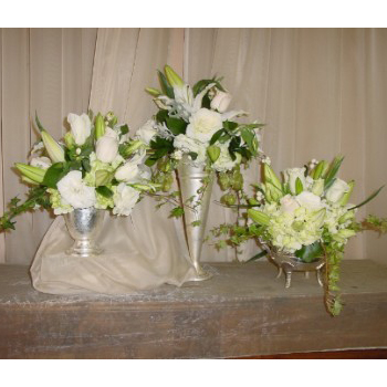 Whote Floral Arrangements in Silver Containers