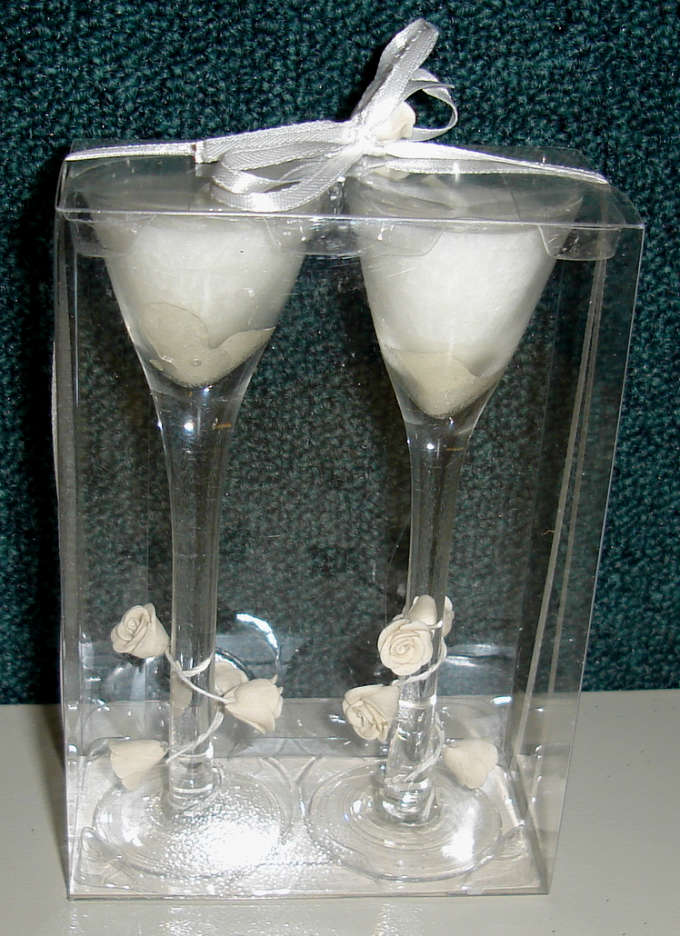 These votive candles make elegant wedding favors or gifts to members of your
