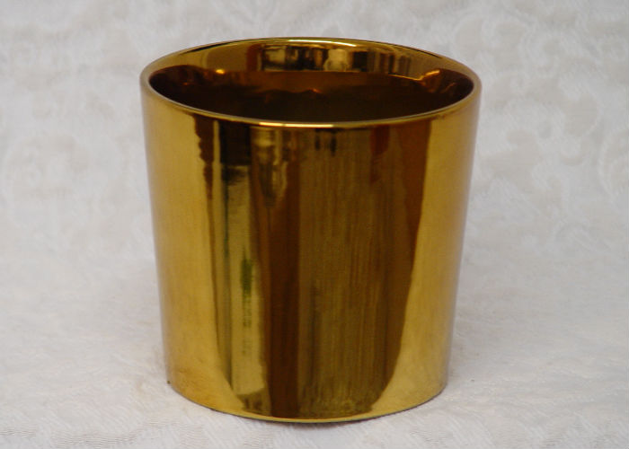 Tapered gold ceramic cylinder